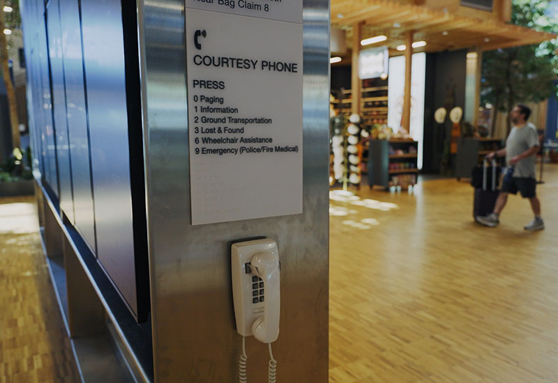 Courtesy phones are found in many locations throughout the terminal including on FIDS displays; dial 1 for information