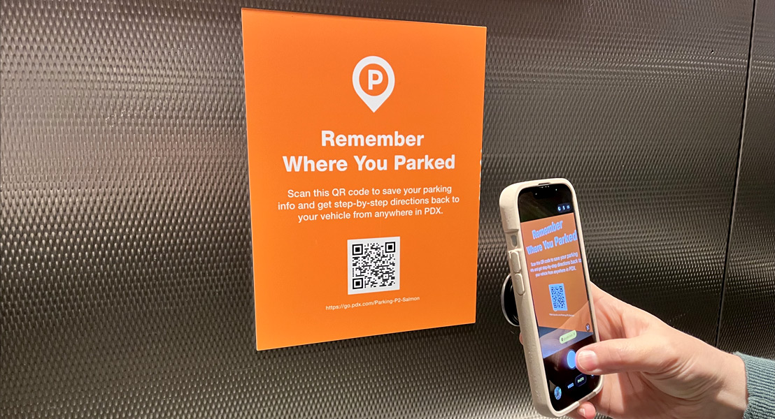 elevator sign with qr code to scan to remember where you parked