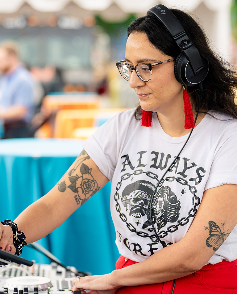 woman DJing with wind in her hair
