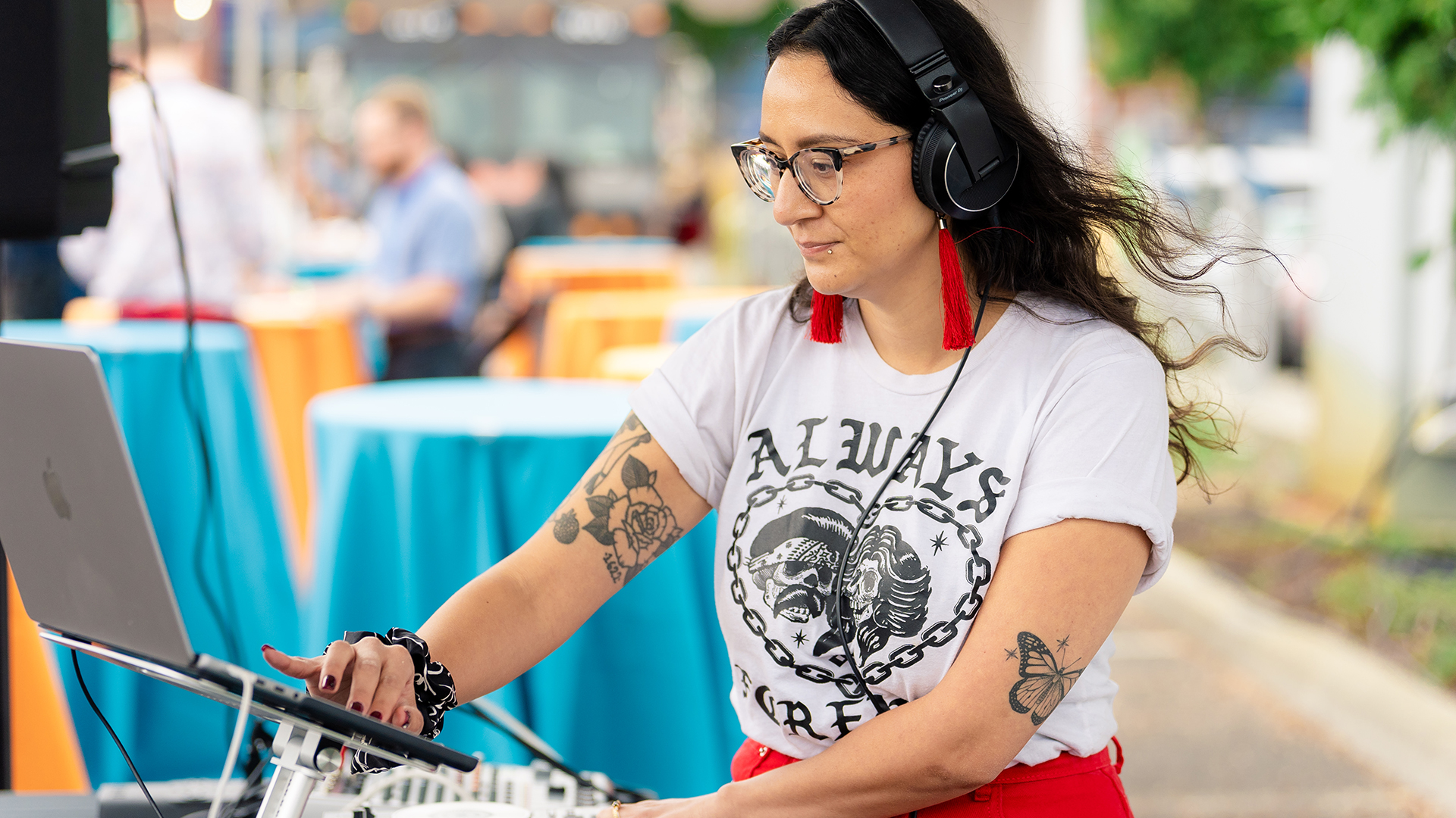 woman DJing with wind in her hair