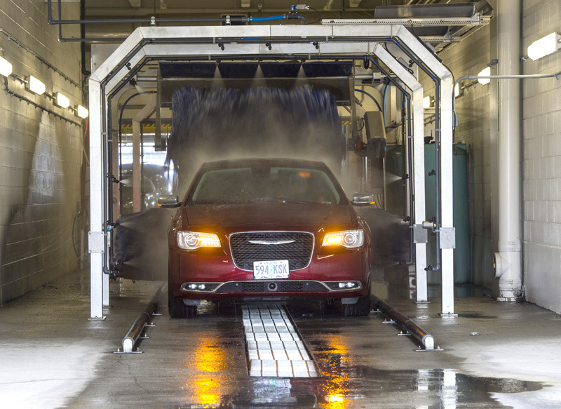 the quick turnaround center at PDX has a carwash for rental cars
