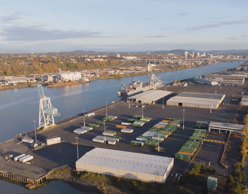 Before and after aerial of Terminal 2 shipping containers and warehouses and new Mass Timber Housing Innovation Campus rendering with modern buildings