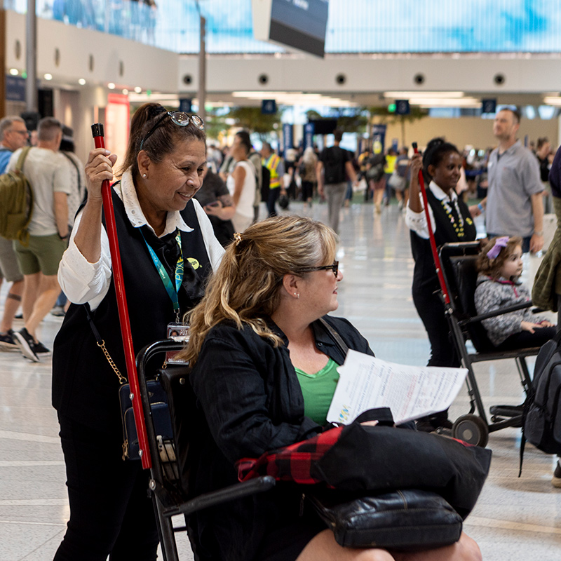 two passengers using wheelchair assistance