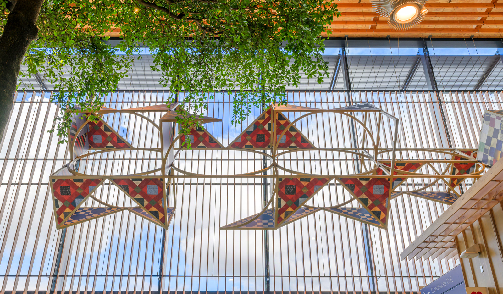 Odyssey geometric sculpture by artist Sanford Biggers on display at Portland International Airport