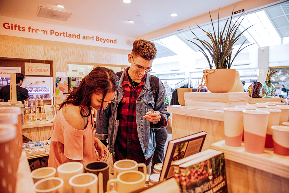 Two people shopping at Tender Loving Empire